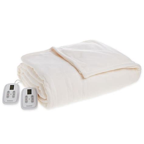 Squeeze out excess water (do not wring, because that can damage wires). . Brookstone fleece heated blanket